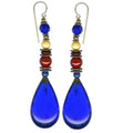 Owen Glass Collection earrings with intricate glass design and silver hooks, elegant jewelry accessory.
