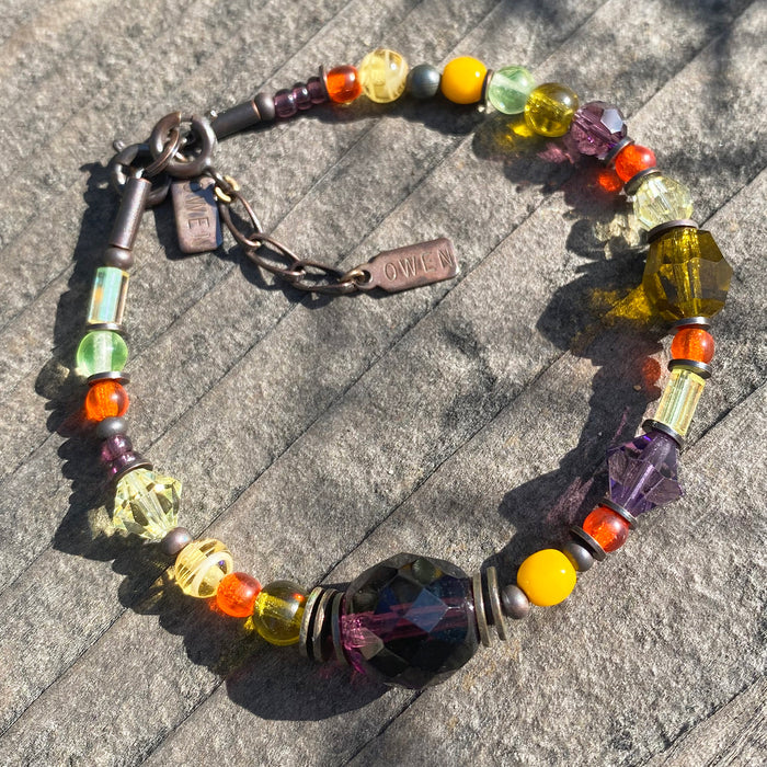 Owen Glass Collection 355 bracelet featuring sleek metal design with intricate detailing, stylish accessory for everyday wear.