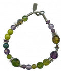 Owen Glass Collection 5 Point Plan bracelet with multiple silver-toned beads and adjustable cord on a neutral background.