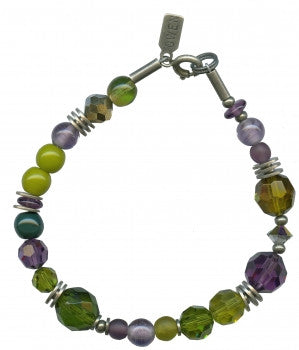 Owen Glass Collection 5 Point Plan bracelet with multiple silver-toned beads and adjustable cord on a neutral background.