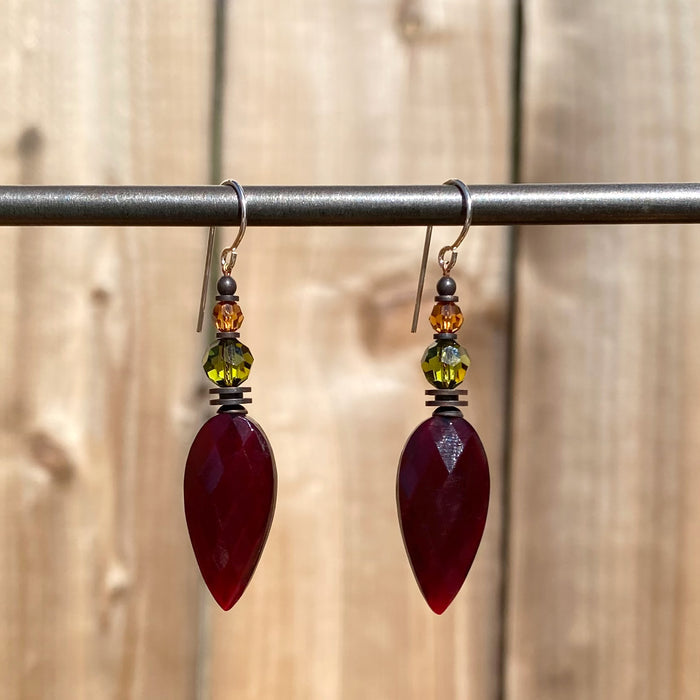 Owen Glass Collection "533" garnet glass dangle earrings featuring deep red, faceted glass beads on silver hooks.