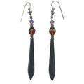 Elegant gold earrings from the Owen Glass Collection with intricate glass detailing, displayed on a neutral background.