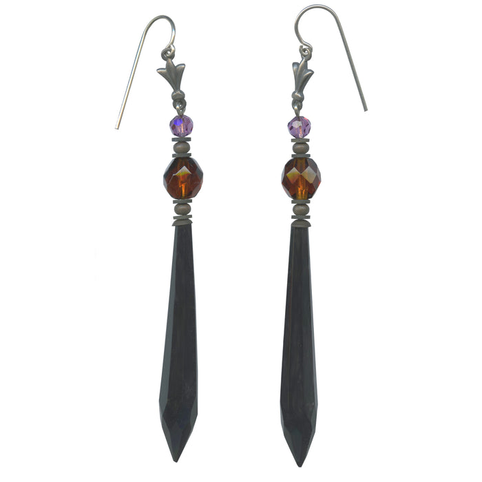 Elegant gold earrings from the Owen Glass Collection with intricate glass detailing, displayed on a neutral background.