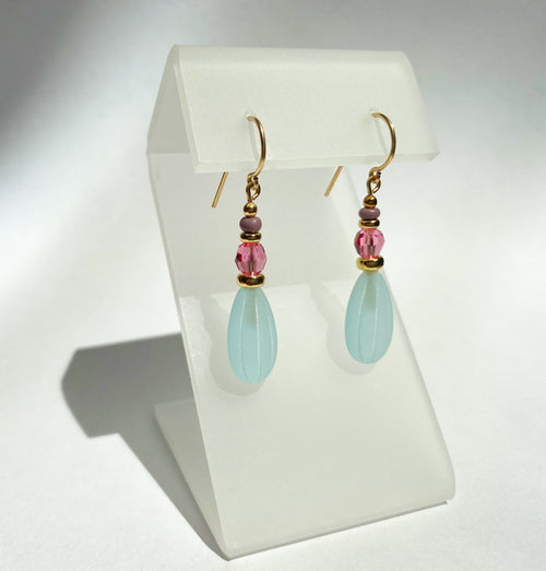 Frosted aqua glass and gold earrings from Owen Glass Collection featuring a modern, elegant design with gold accents.