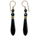 Owen Glass Collection "882" jet and gold dangle prism earrings with geometric design and shiny finish.