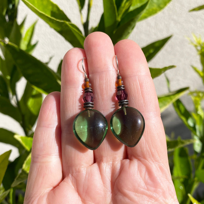 Green glass dangle earrings with almond-shaped design, amethyst crystal accents, from Owen Glass Collection.