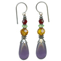 Owen Glass Collection earrings featuring modern geometric design in clear and frosted glass, displayed on a neutral background.