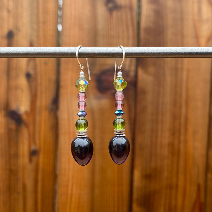 Owen Glass Collection earrings featuring elegant glass design with intricate detailing and a polished finish.