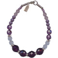 Beaded glass bracelet with amethyst tones from Owen Glass Collection, featuring purple and lavender beads on a stretch cord.