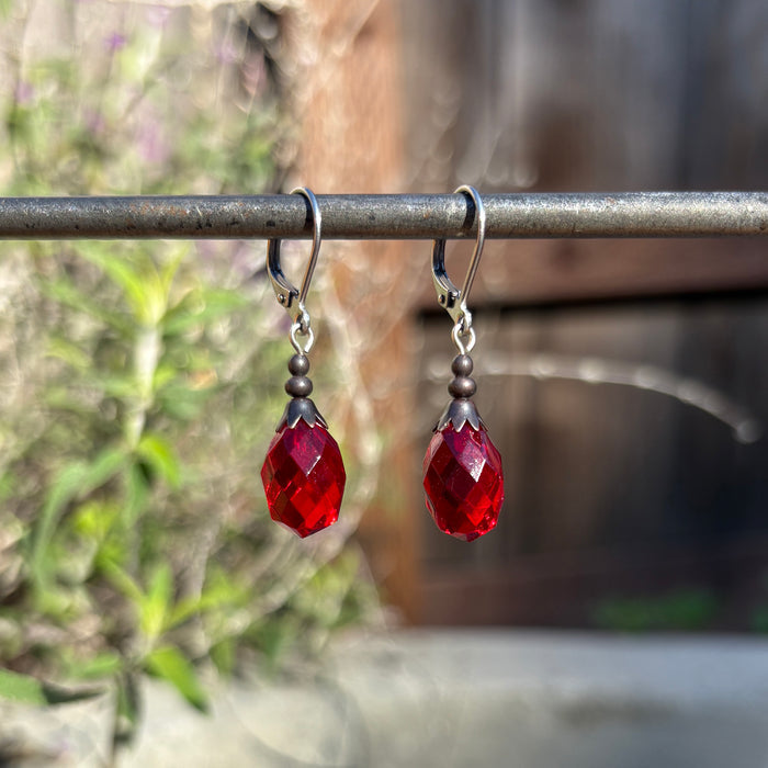 Antique red Czech glass drop earrings from Owen Glass Collection with intricate design and elegant drop shape.