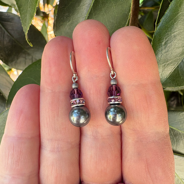 Dark silver crystal drop earrings with 10-inch bells and amethyst rhinestones from Owen Glass Collection.
