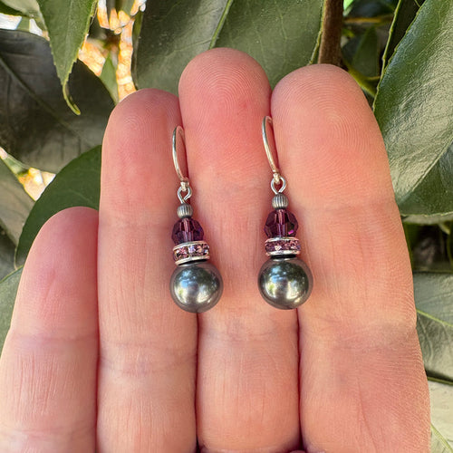 Dark silver crystal drop earrings with 10-inch bells and amethyst rhinestones from Owen Glass Collection.