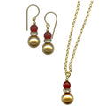 Owen Glass Collection Bells 26 earrings and necklace set featuring silver-tone bells and matching jewelry pieces.