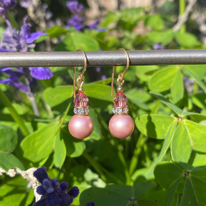 Dark pink crystal pearl earrings with gold trim and rhinestones from Owen Glass Collection, featuring bell-shaped design.