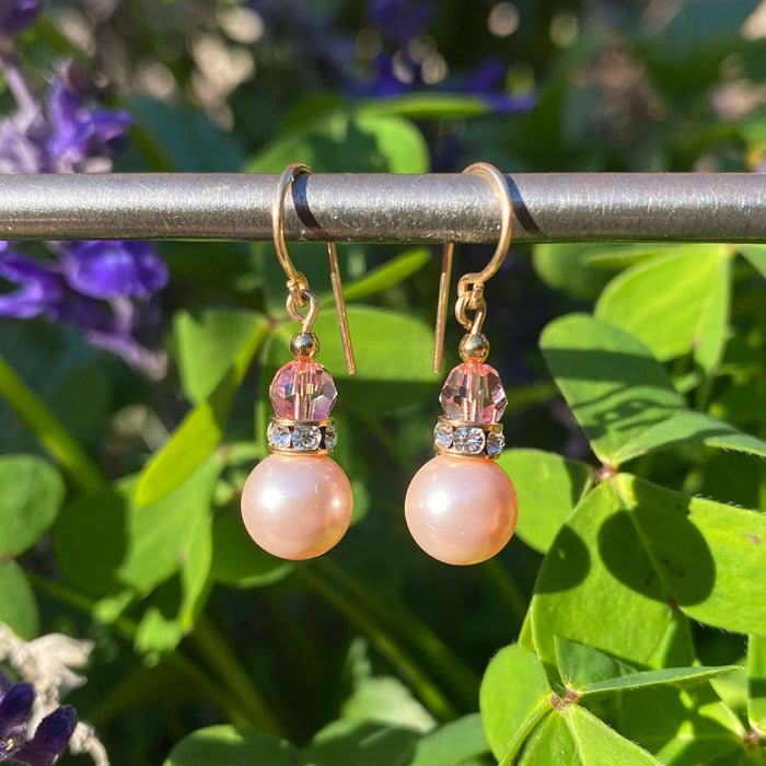 Pink crystal pearl earrings with gold trim and rhinestones from Owen Glass Collection featuring bells design.