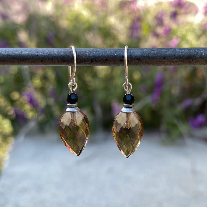 Owen Glass Collection Birdsong 13 earrings featuring delicate bird and floral design in gold and silver tones.