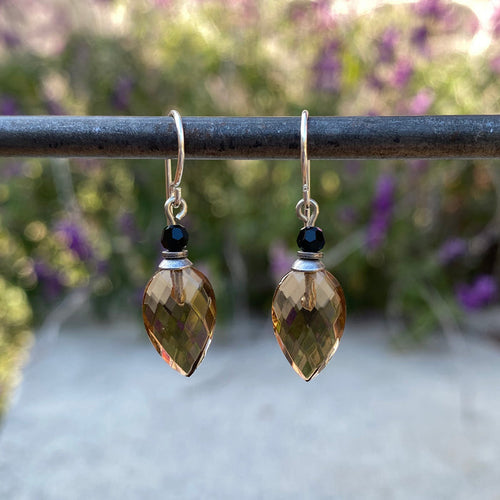 Owen Glass Collection Birdsong 13 earrings featuring delicate bird and floral design in gold and silver tones.