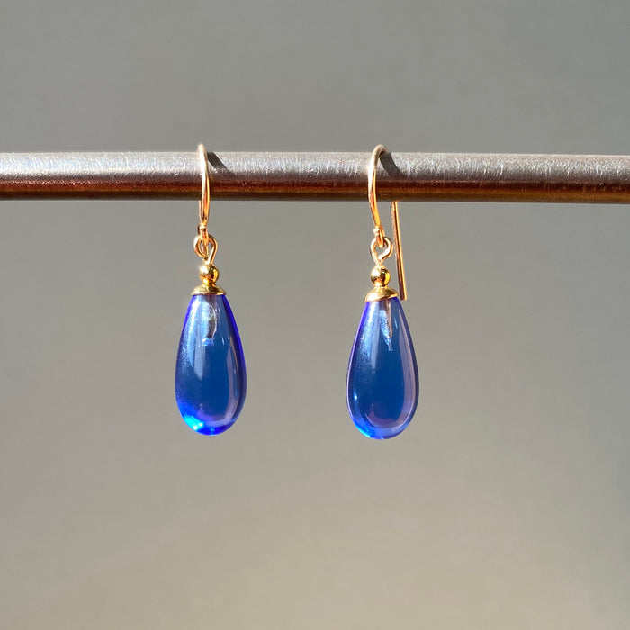 Brights 25-inch sapphire glass and gold dangle earrings from Owen Glass Collection, featuring vibrant blue glass and elegant gold accents.