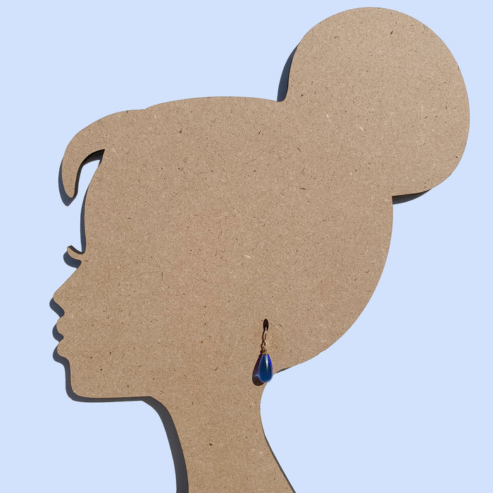 Brights 25-inch sapphire glass and gold dangle earrings from Owen Glass Collection hanging with intricate design details.