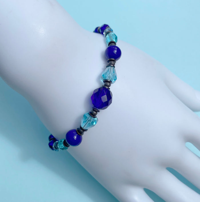 Cobalt blue Czech glass and aqua crystal bracelet from Owen Glass Collection, featuring vibrant beads and elegant design.