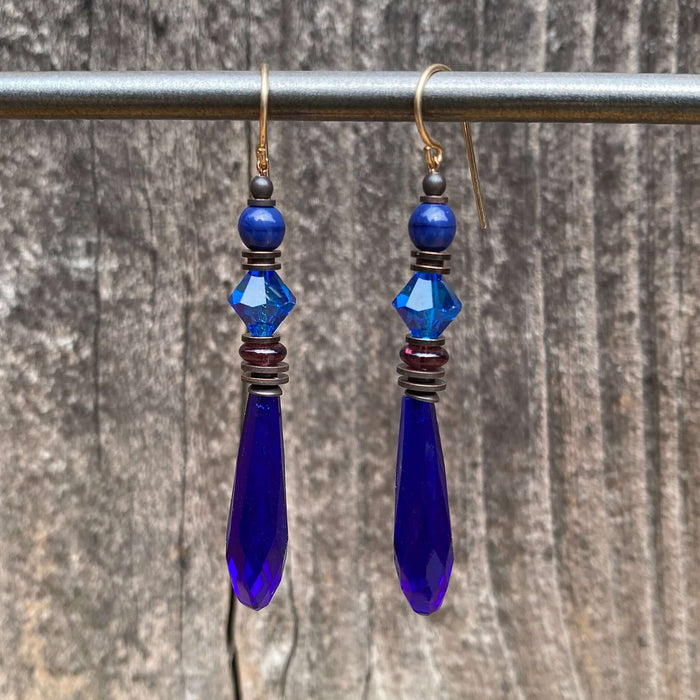 Cobalt blue glass chandelier earrings from Owen Glass Collection featuring intricate blue moon design and elegant dangling style.