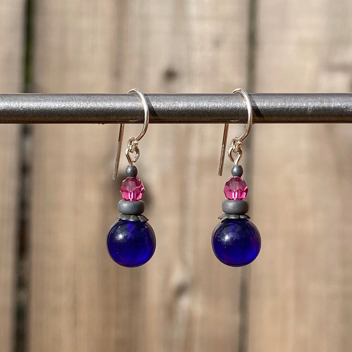 Cobalt glass and fuchsia crystal drop earrings from Owen Glass Collection featuring bubble-like design and elegant dangle style.
