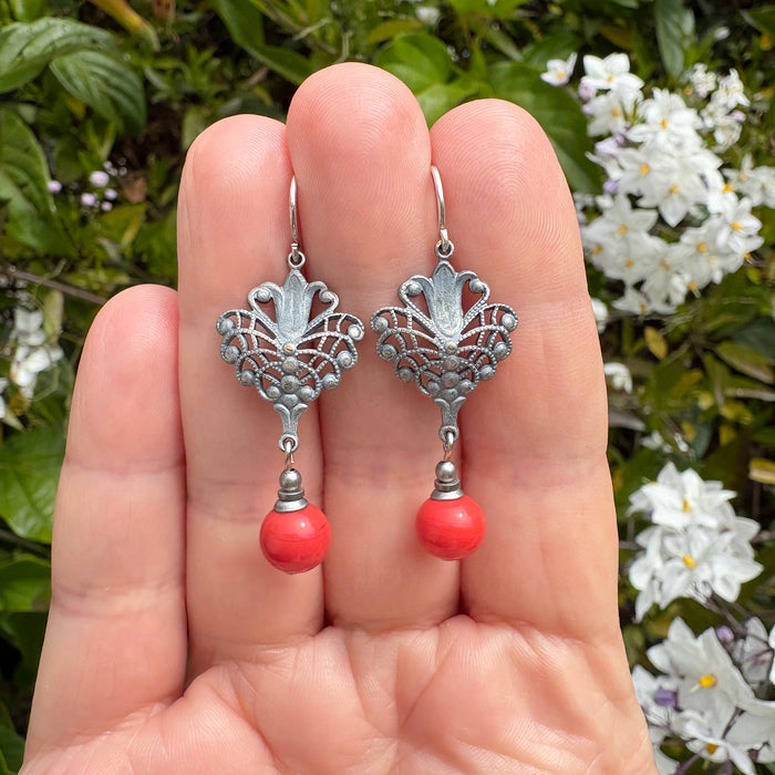 Coral glass and silver filigree drop earrings from Owen Glass Collection, featuring intricate craftsmanship and elegant design.
