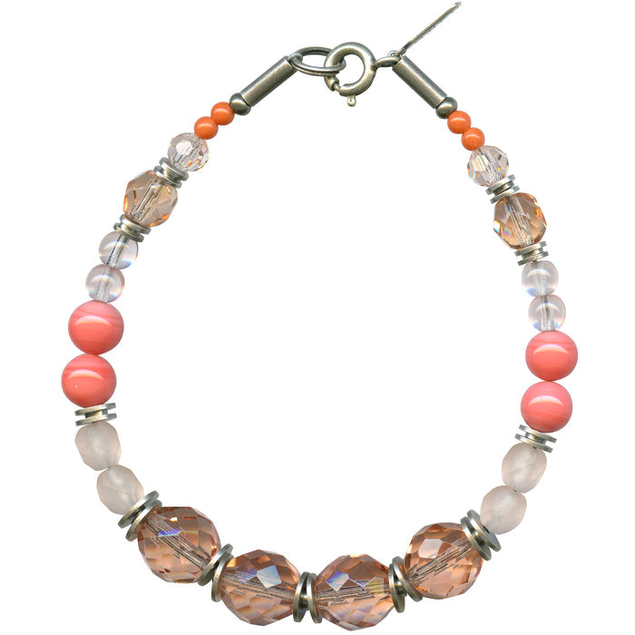 Owen Glass Collection coral and pink Czech glass bracelet with vibrant beads, perfect for adding a colorful touch to your outfit.