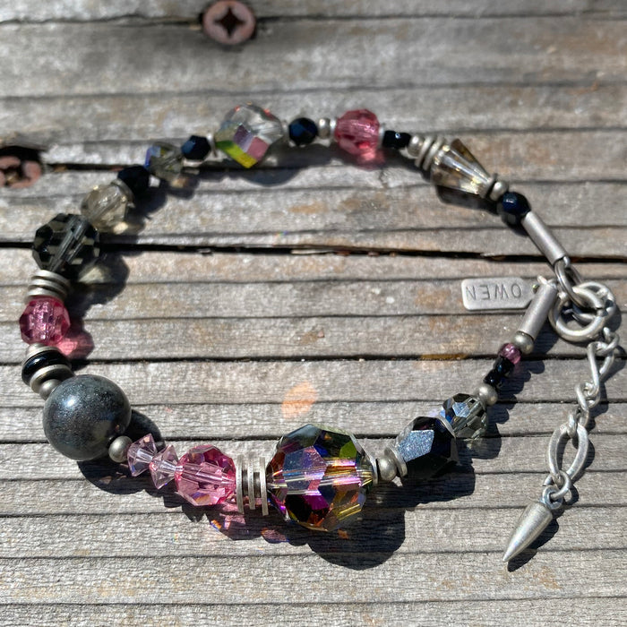 Owen Glass Collection Counterforce bracelet featuring sleek design and adjustable fit, crafted with high-quality materials.