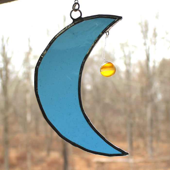 crescent mooncatcher: sky blue with sunshine aura orb
