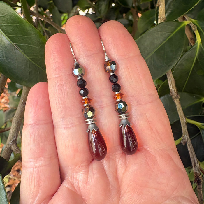 Owen Glass Collection "499" dark topaz glass and crystal earrings with elegant dangling design and sparkling accents.