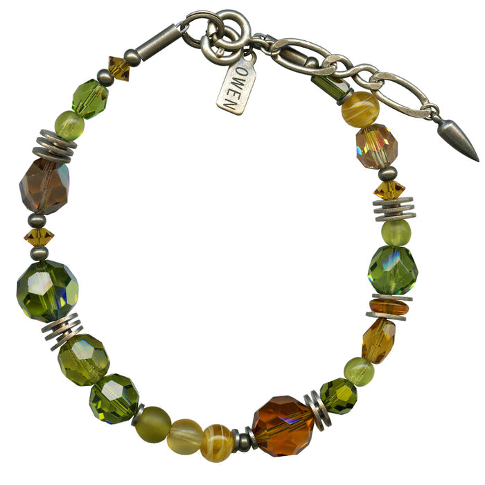 Owen Glass Collection beaded bracelet with dark topaz and olivine crystals, featuring intricate beadwork and a natural-inspired design.