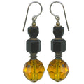 Owen Glass Collection FAUNA 2 earrings featuring intricate metalwork and animal-inspired design on a white background.