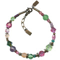 Beaded pink crystal and bronze bracelet from Owen Glass Collection, featuring intricate beaded design and elegant craftsmanship.