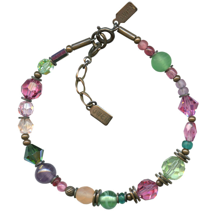 Beaded pink crystal and bronze bracelet from Owen Glass Collection, featuring intricate beaded design and elegant craftsmanship.