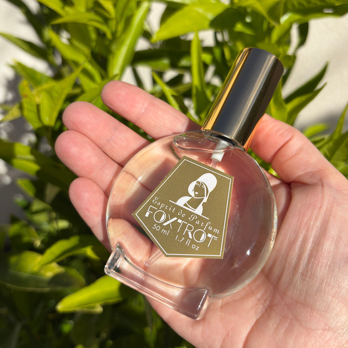Owen Glass Collection Foxtrot Esprit de Parfum with citrus and floral notes, featuring a sleek glass fragrance bottle with a gold cap.