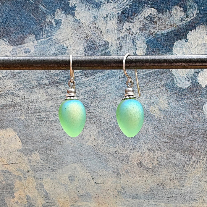 Frosted light green glass drop earrings with aurora borealis sheen, featuring berry-shaped design by Owen Glass Collection.