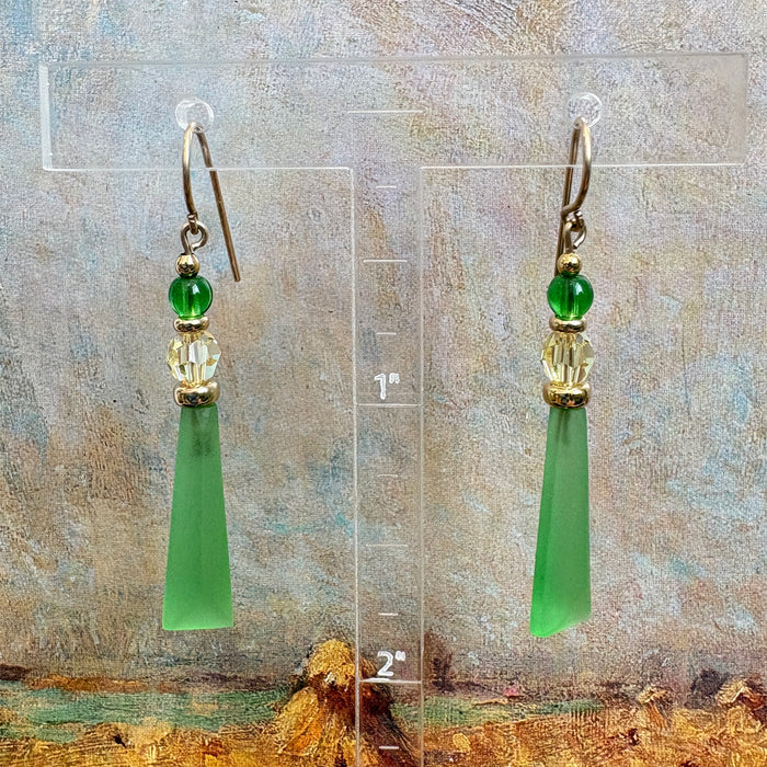 Frosted peridot green glass and gold earrings from Owen Glass Collection, elegant dangle jewelry with intricate design.
