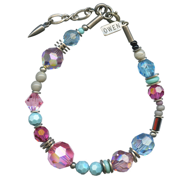 Fuchsia, turquoise, and aquamarine Czech glass and crystal beaded bracelet from Owen Glass Collection with silver accents.