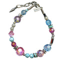 Fuchsia, turquoise, and aquamarine Czech glass and crystal beaded bracelet from Owen Glass Collection with silver accents.