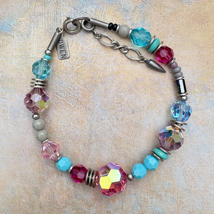 Fuchsia, turquoise, and aquamarine Czech glass and crystal beaded bracelet from Owen Glass Collection, featuring vibrant, colorful beads.