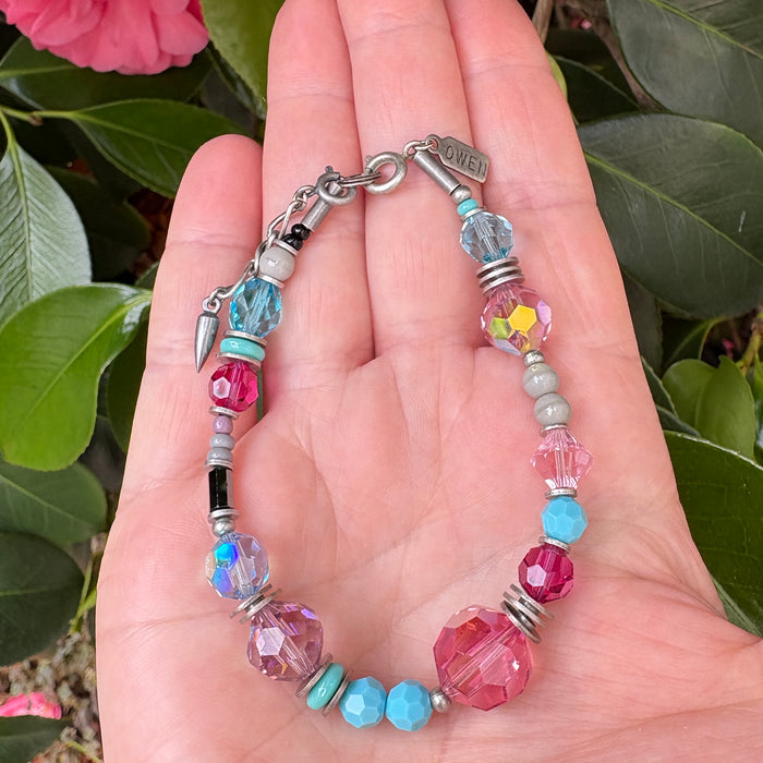 Fuchsia, turquoise, and aquamarine Czech glass and crystal beaded bracelet from Owen Glass Collection, silver accents.