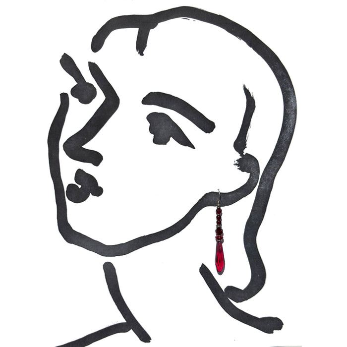 Minimalist black ink line drawing of a woman's profile on a white background, wearing a single dangling red teardrop earring.