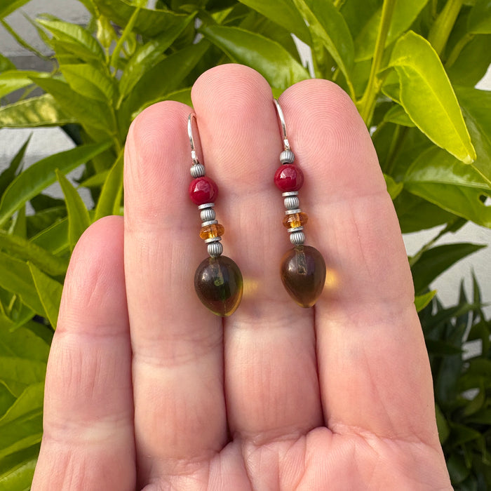Colorful glass earrings from Owen Glass Collection featuring watercolor-inspired green, topaz, and red hues.