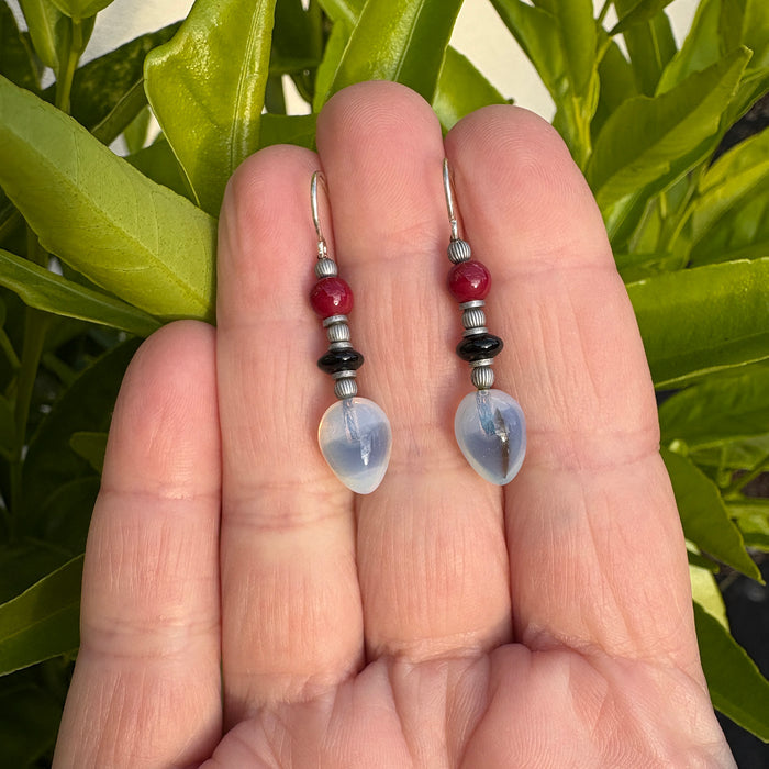 Glass earrings with watercolor-inspired grey, black, and red designs from Owen Glass Collection, showcasing vibrant, artistic earrings.