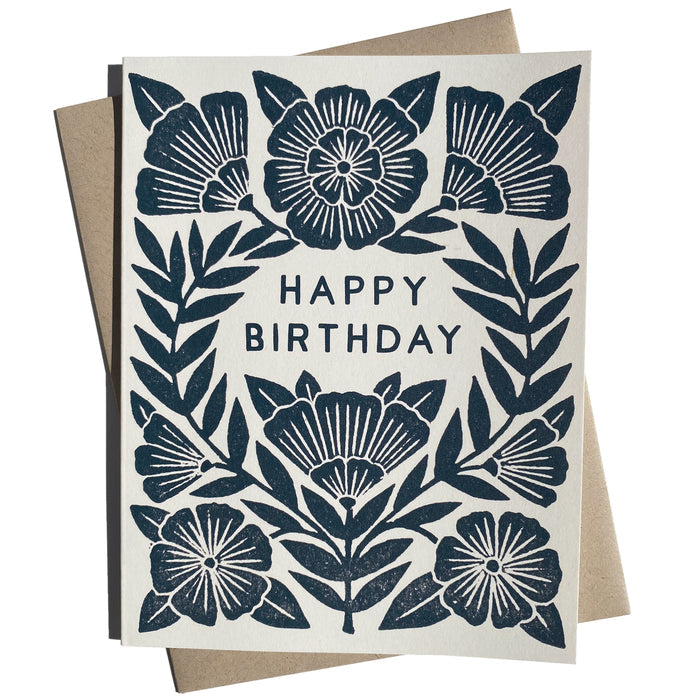Owen Glass Collection happy birthday greeting card with blue flowers and cheerful design on white background.
