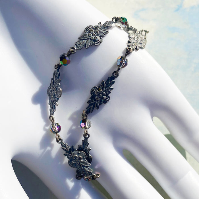 Iridescent Austrian crystal bracelet with intricate filigree design from Owen Glass Collection, showcasing sparkling craftsmanship.