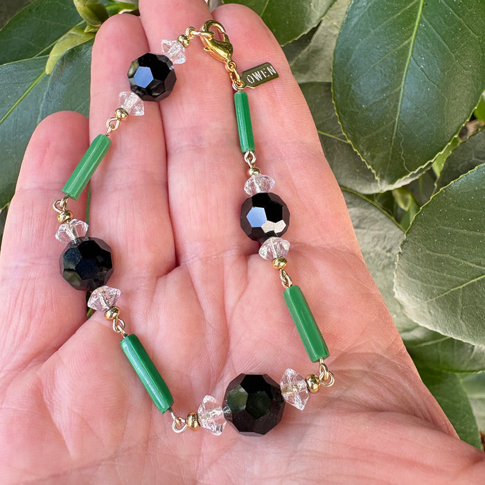 Jade and jet crystal bracelet from Owen Glass Collection featuring green jade and black jet beads on a stretch cord.
