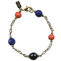 Cobalt and coral Czech glass bracelet from Owen Glass Collection with jet accents, featuring intricate beadwork on a stylish bracelet.