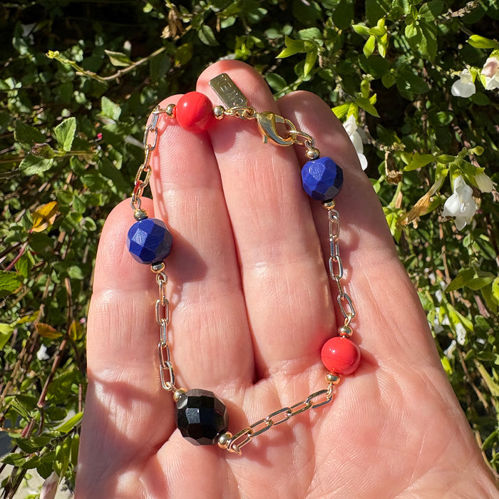 Cobalt and coral Czech glass bracelet from Owen Glass Collection featuring jet black glass beads and intricate design.